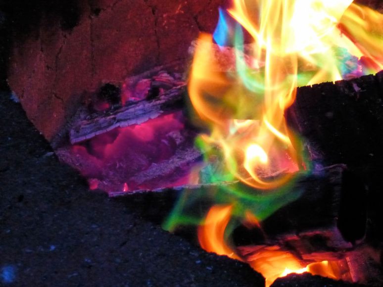 Colourful flames of a campfire