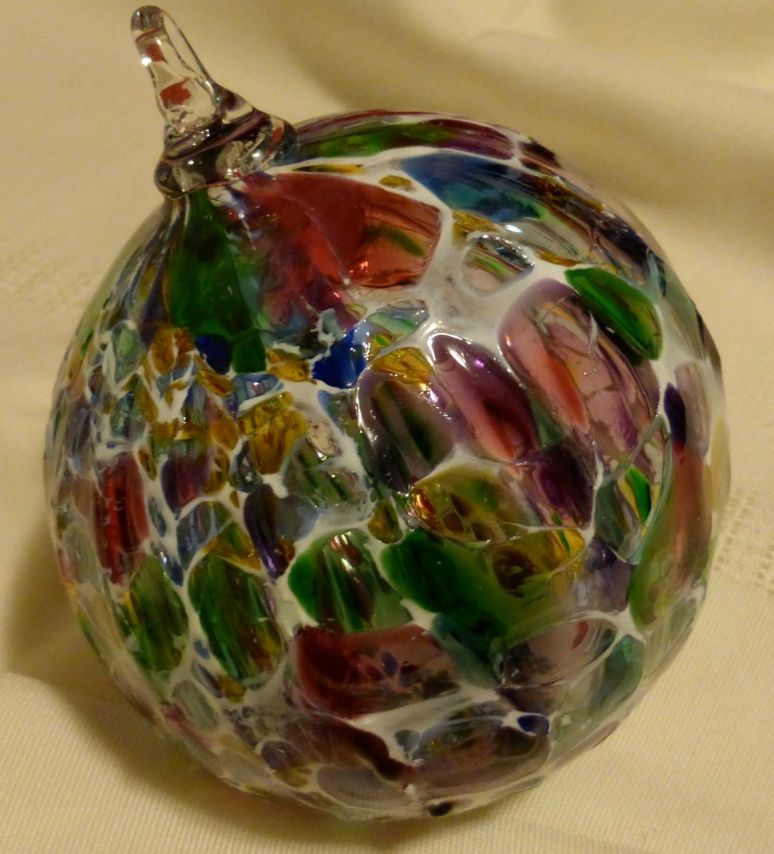 Multicolored glass Christmas ball by Robert Gary Parkes.